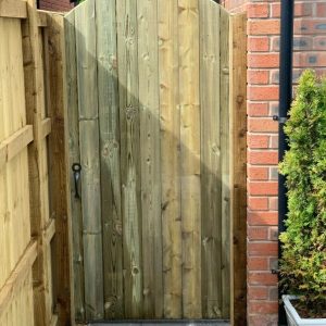 Wooden arched tongue and groove gate
